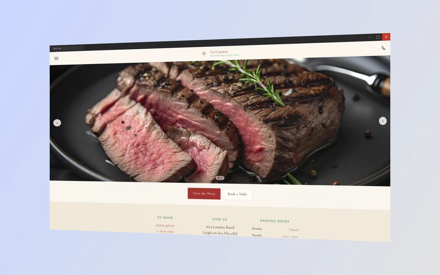 La Casetta home page shown on a laptop
